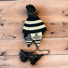 Lovely vintage style Dappy ear flap bobble hat in black/beige stripes. One size.