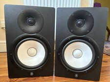 Pair of Yamaha HS8 Studio Monitor Speakers with power cables.