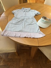 Ladies ping Golf Top, Skirt And Visor Size 10. Great Condition And Barely Worn.