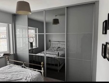 Sliding mirrored wardrobe doors