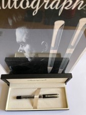 AUTOGRAPH BLACK AND SILVER