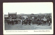 Postcard of German South West: Provisioning columns loading cargo in Karibib