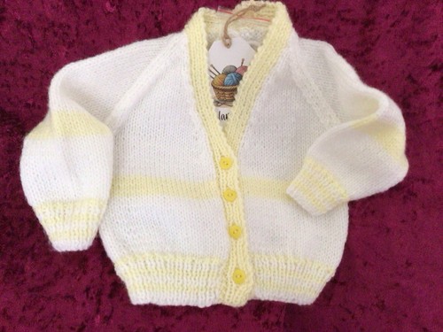 Hand knitted baby - hand,