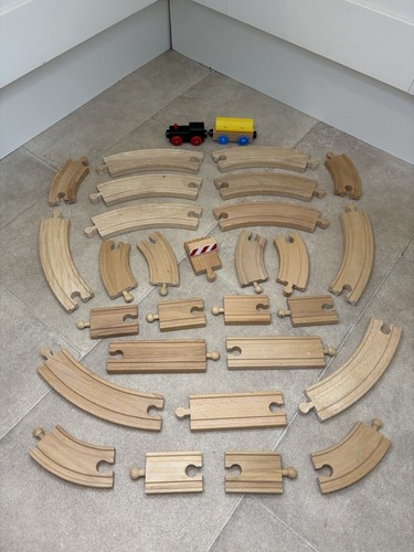 Wooden train track pieces - train,