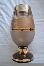 Stunning vintage glass vase with Gold pattern. smoked glass base.