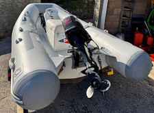 Zodiac RIB with Mercury 25hp outboard, purpose built road trailer, & safety kit.