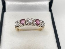 9ct Gold Hallmarked Ruby & Cubic Eternity Ring. Goldmine Jewellers.