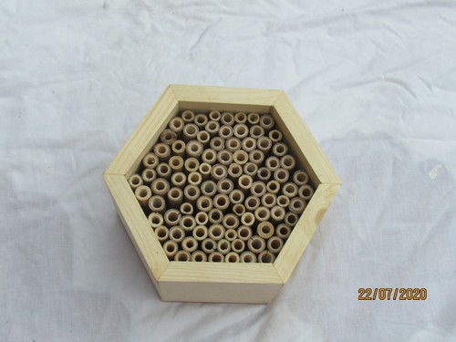 Hand crafted mason bee hive - hand,