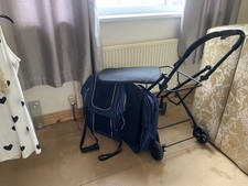 Buggy Pram for Dogs. Will Fit 2 Dogs 15 Kg Per Compartment very Good condition. 