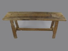 Bench made of teak root wood