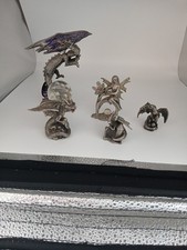 Pewter Dragons X 4 Plus 1