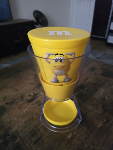 Yellow sweet dispenser - m&m's,