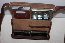 Polaroid SX-70 Land Camera with Case, Manual, Book, and 7 flash bars