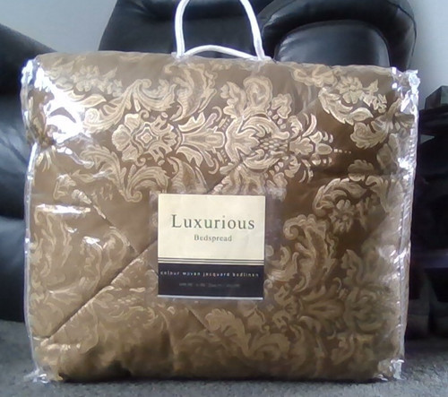 Luxurious gold bedspread - luxurious,