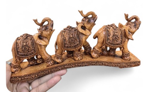 Hand carved wooden elephants - carved,