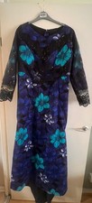 African Women Blue Flowered Lace Traditional Dress