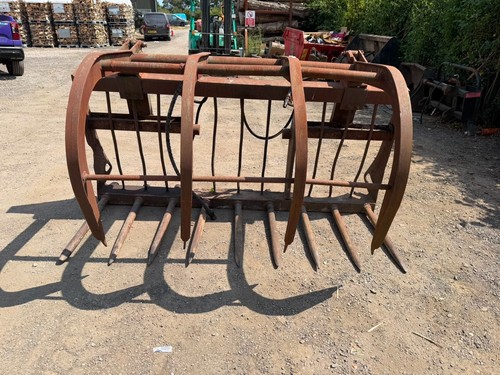 Hydraulic muck grab for - muck,