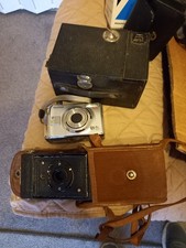 Old Collectible Cameras Job