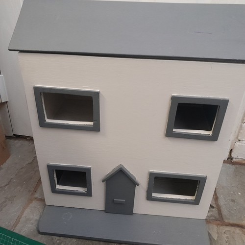 Vintage wooden dollhouse with
