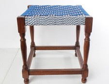 A vintage beautiful weave topped stool