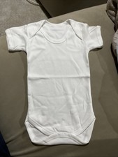 White Baby Grows 6-12 Months