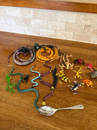 Assorted plastic snakes - plastic,