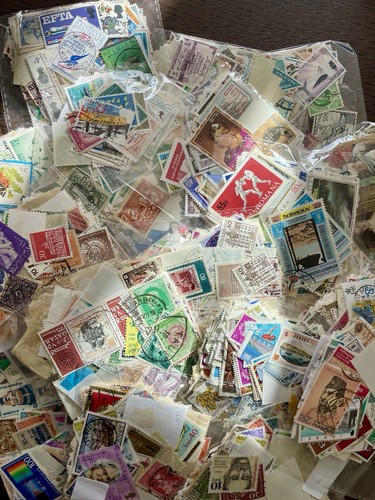 Assorted world postage stamps - assorted,