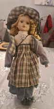 PORCELAIN COLLECTOR’S DOLL IN PLAID DRESS – H: 40CM