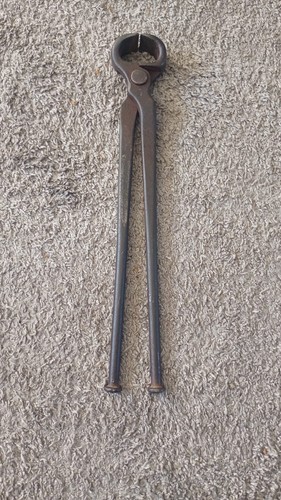 Long pincer pliers possibly - pliers,