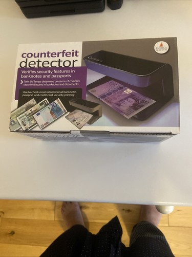 Counterfeit money detector - counterfeit,
