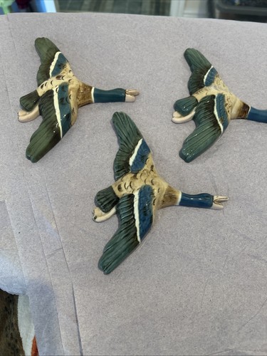 Flying ceramic ducks - flying,