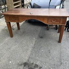 A large hardwood desk 
