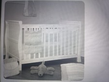 New sleigh cot - new, converts
