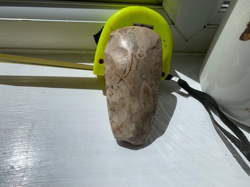 Polished flint axe - head, found