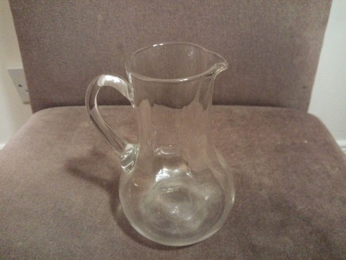 Vintage small glass water jug