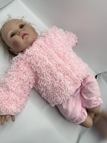 Hand knitted baby girls - hand,