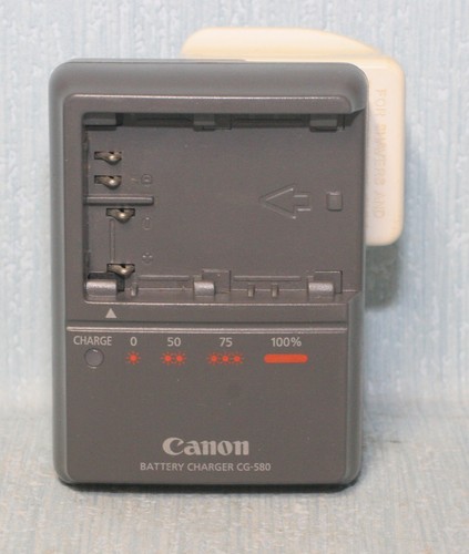 Genuine canon charger 580 - genuine,