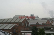 PHOTO  SPONDON THE ROOFS OF CELANESE VIEW OF THE CELANESE ACETATE FACTORY FROM T
