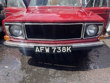 1972 VOLVO 144 FRONT GRILL GRILLE & HEADLAMP SURROUND BEZELS & LIGHT HOLDERS
