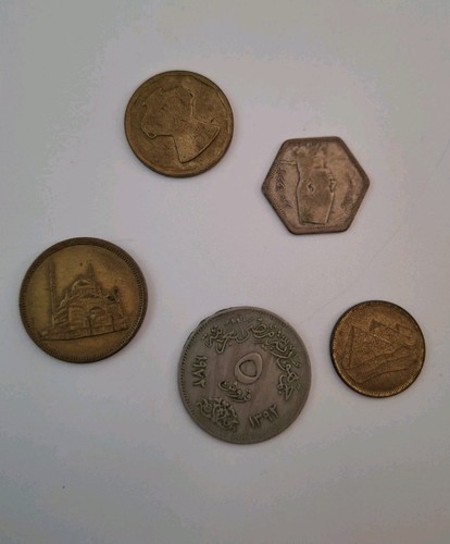 Five egyptian coins - five,