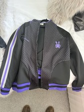 Clint’s Inc Jogging Suit