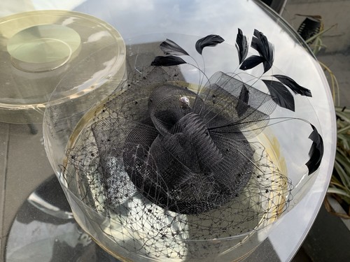 Black feather fascinator with - feather,