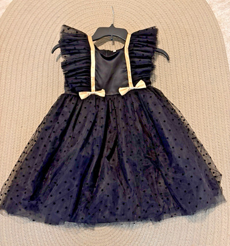 Black and gold sleeveless - and,