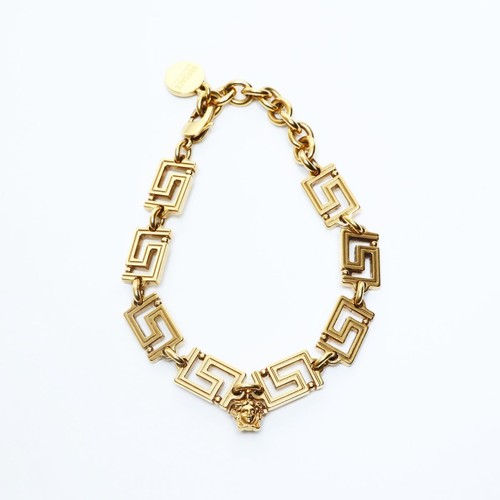 Used versace bracelet gold - used,
