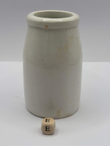 Old white stoneware jar