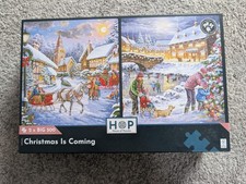 Hop 2 x BIG 500 Piece Jigsaw Puzzles "Christmas Is Coming" by Keith Stapleton.