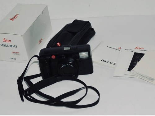Leica very good - +,