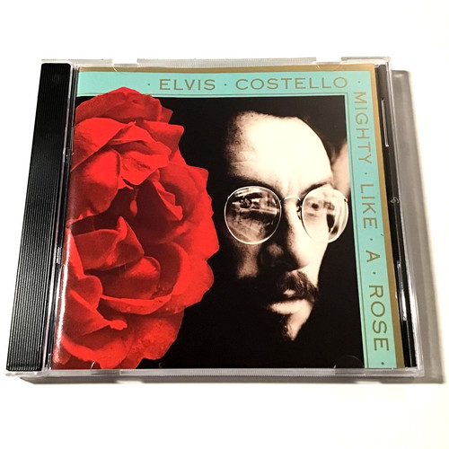 Elvis costello mighty like a - elvis,