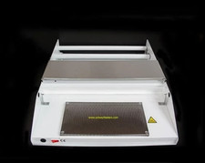 TRAY WRAPPING MACHINE