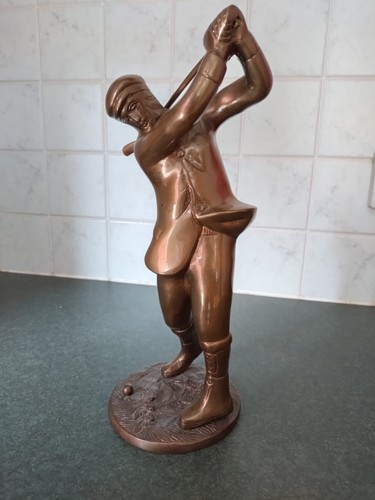 Heavy bronze golfer - heavy,
